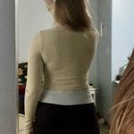 NIKIBIKI Cropped Long Sleeve Top Photo 5