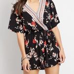 Maurice's Black Floral V Neck Romper Photo 0