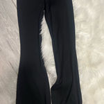 Women's Black Flared Leggings Photo 0