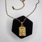 Cherub angel tag charm necklace Gold Photo 0