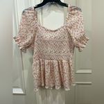 In Loom  NWT Super cute peplum top with floral design size L Photo 1