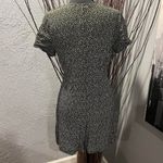 🌺NWT BB DAKOTA STEVE MADDEN BLACK AND YELLOW FLORAL ROMPER SIZE X Photo 4