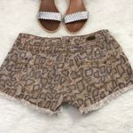 1st Kiss Distressed Animal Print Shorts Photo 1