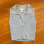 House of Harlow Chic ribbed tank with a collared V-neck. Soft and stylish for versatile wear.   1960 Light Blue Ribbed Tank Top Photo 1