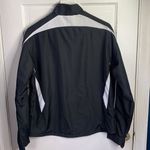 Under Armour  Women’s Crave Jacket Black with White Trim Windbreaker W-195 Size L Photo 6