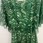 Giani Bernini Gianni Bini green pattern dress 
Beautiful green pattern and following
Size XS‎ Photo 5