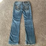 Miss Me  Irene bootcut jeans Medium wash Distressed in areas Size 28 Flap pockets Photo 1