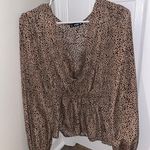 SheIn Animal Print V Neck Long Sleeve Peplum Blouse Photo 0