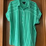 Investments  green striped blouse Photo 0