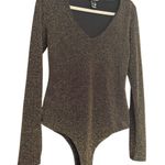 Charlotte Russe Glittering Black and Gold Bodysuit NWOT Photo 0