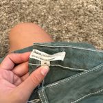 Garnet Hill Cute dark green flare bottom jeans low rise Photo 2