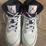 Nike Air Jordan 1 Mid Photo 1
