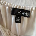 A. Calin  white flowy boho mini dress with floral details nwot Photo 1