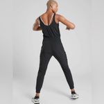 Athleta Unbound Jumpsuit Athletic Romper Yoga Sporty Travel in Black Size L Photo 2