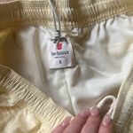New Balance  Yellow Athletic Shorts Lightweight Performance Photo 2