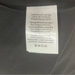 We Wore What NWT  Black Asymmetrical Cutout Dress Short Sleeve Flower Pin Size L Photo 7