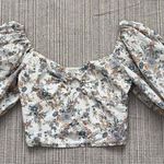 Abercrombie & Fitch floral patterned puff sleeve top with circle cut out Photo 0