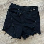 NWOT fashion black ripped jean shorts. Cross over Photo 0