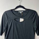Green envelope short sleeve black keyhole top women’s size medium NWT Photo 2