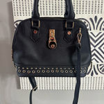 Black Handbag with Gold Accents Photo 0