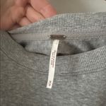 Free People M She’s Just Cute Gray Sweatshirt with Floral Ruffle Accents Photo 3