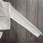 Princess Polly | 90s Y2K Nicola Long Sleeve Ruffled Mock Neckline White Crop Top Photo 6