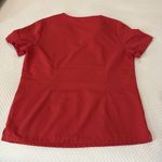 FIGS  deep coral V-Neck Scrub Top Photo 2