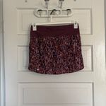 Athleta Stylish  Women's  Run With It 14” Skirt in Purple Print Photo 1