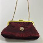 Red and Gold Velvet Clutch with Decorative Clasp Photo 4