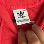 Adidas  graphic sweatshirt unsized in coral color Photo 2