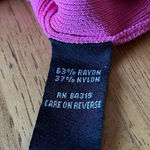 Cyrus top, pink with cutouts on the top portion and both sleeves. Photo 4