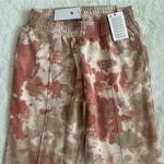 Nike (NWT) Loose Fit Tie Dye Cuffed Sweatpants in Dusty Orange, Medium Photo 2