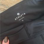 Athleta  biker shorts in black size large cycling running athletic gym Photo 2