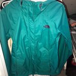 The North Face Blue Rain Jacket Photo 0