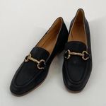 Stylish Black Leather Loafers with Gold Accents Size 6.5 Photo 0