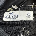 Hollister  Smocked Midi Dress Sleeveless Floral Tank  V Neck Peasant Black XSmall Photo 1