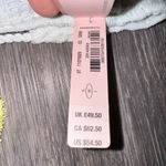 Victoria's Secret Victoria’s Secret White Crochet Halter Bikini Top with Yellow Tassels - Size M Photo 1