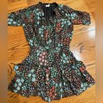 Skylar + Madison  Black Dress with Floral Accents Photo 1