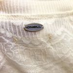 O'Neill O’Neill sweater. Ribbed sleeve cuffs. Raw hem. Photo 6