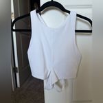 Athleta  Conscious Cut Out Crop Top Crossover Sports Bra D-DD Cups in White Photo 2