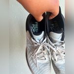 New Balance Women's Athletic Shoes - Black and White Photo 4