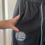 Nike Tailgate Pants NBA Golden State Warriors Water Resist Woman’s size small Photo 5