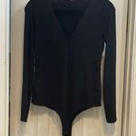 BCBGeneration black bodysuit with sheer side panels Photo 0
