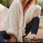 Free People Movement Take a Moment Faux Fur Hooded Jacket in ivory. Photo 10