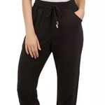 Ted Baker  Toriil Ruffled Cold-Shoulder Jumpsuit Black / Gray‎ Size 0 / US 2 Photo 0