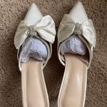 Amazon White Mules Photo 1