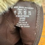 Dream out loud by Selena Gomez Dream Out Loud‎ by Selena Gomez furry boots heels Photo 6