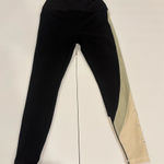 Peloton Cadent High-Rise Colorblock Leggings – Black Beige Green Star Print – M Photo 0