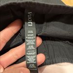 Vuori  Women’s ripstop charcoal pants size estimate small Photo 7