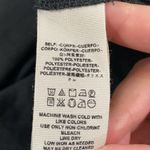 Free People  black Ruffle me up ruffled smocked detail front tie top size S Photo 13